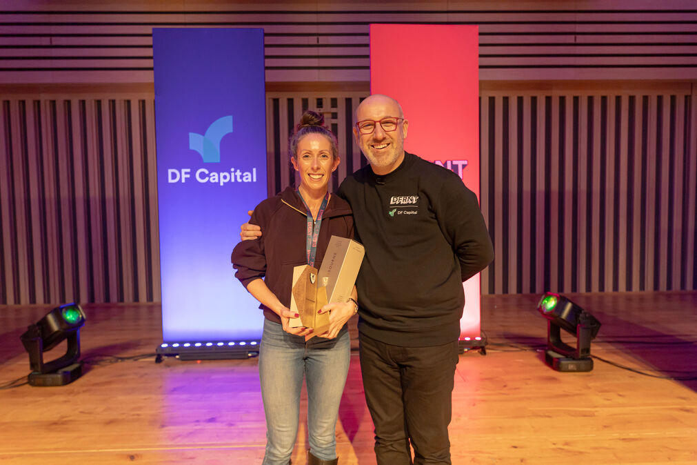 DF Capital employee winning an award