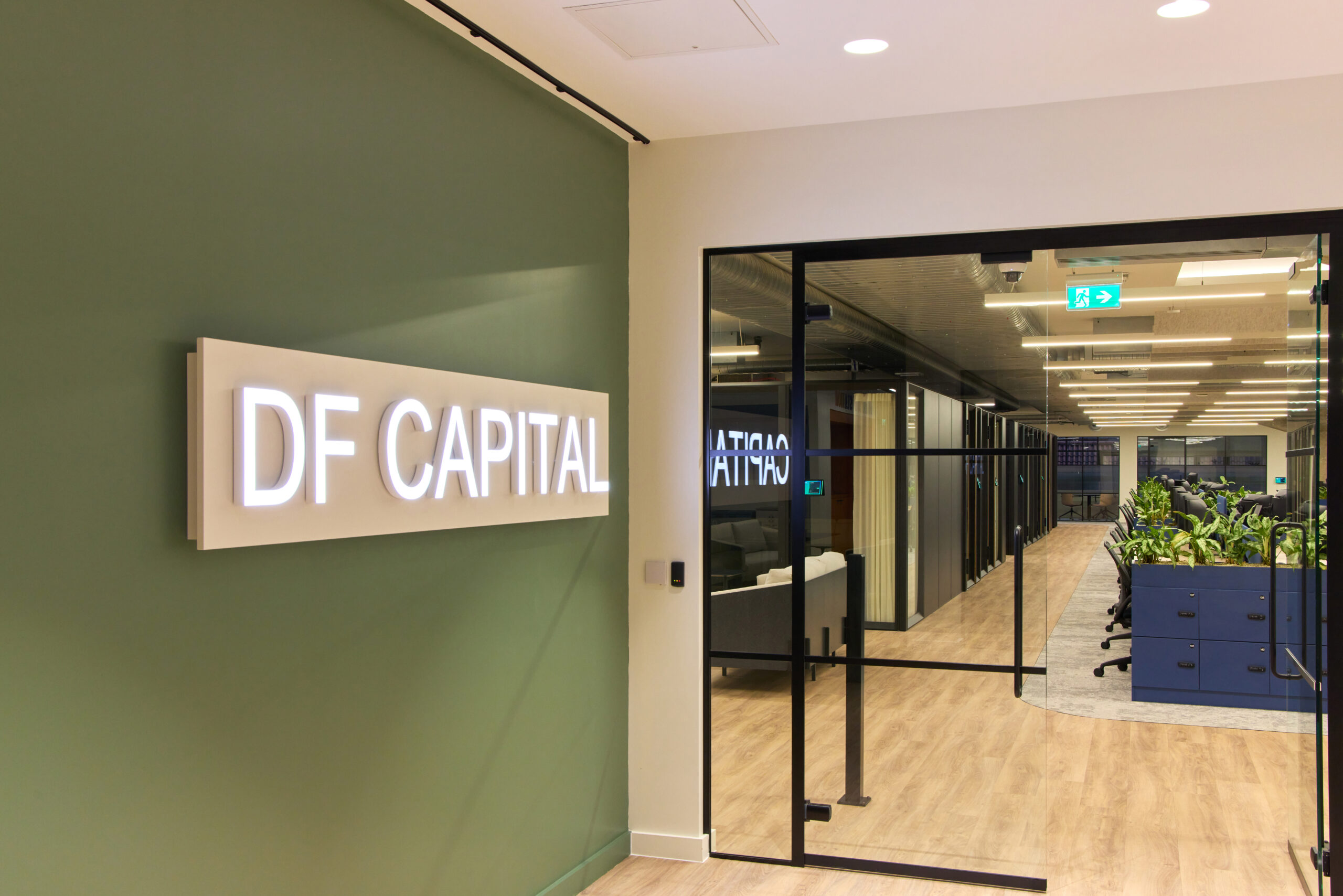 DF Capital glowing logo in office